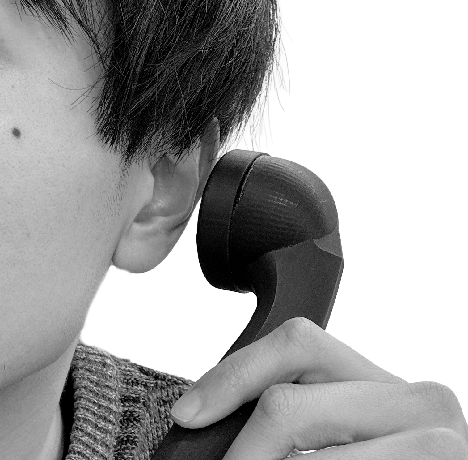 受話器を取り声を聞く